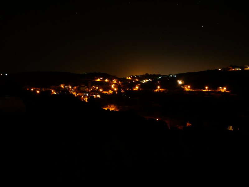 Agios Tychonas at night