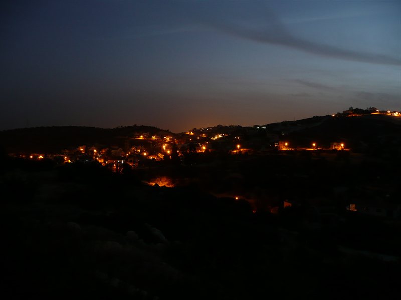 Agios Tychonas at night
