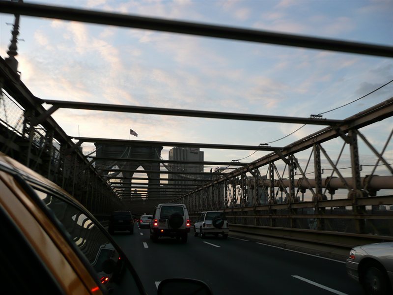 Crossing Brooklyn Bridge in a big yellow taxi
