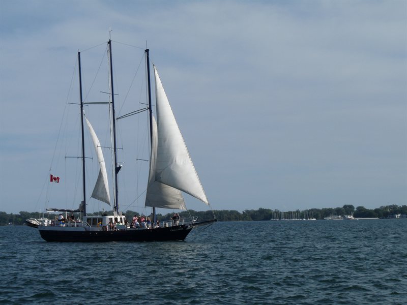 Sailing boat on Lake Ontario with the Toronto Islands behind