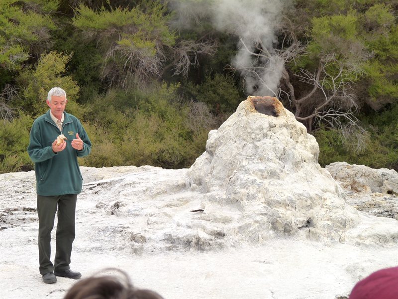 Man adding soap to Lady Knox Geyser