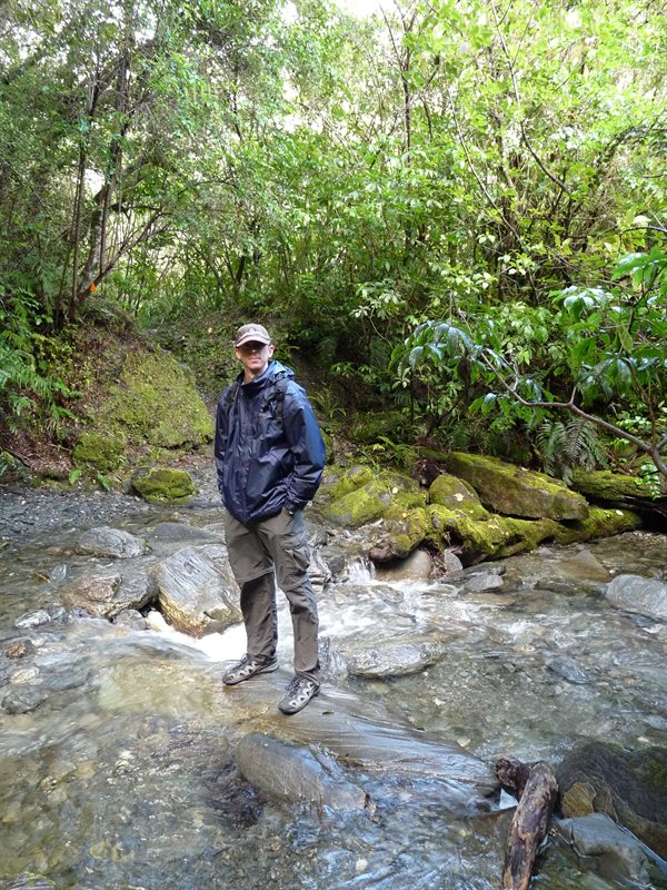 Ed crossing a stream on the way to Roberts Point