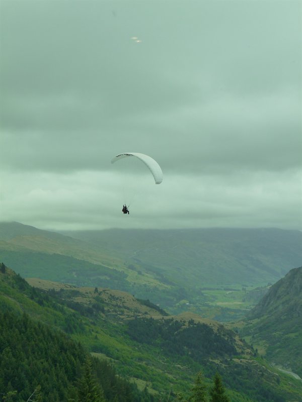 Paraglider over Queenstown