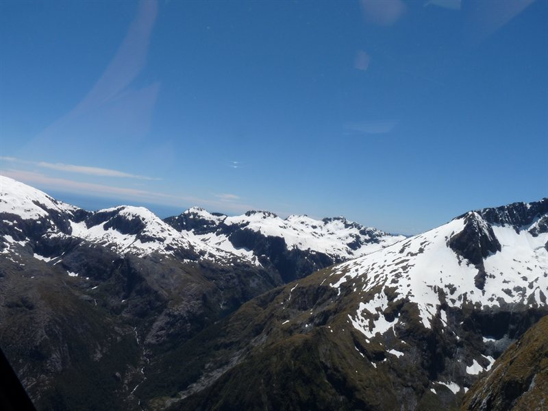 Snow capped mountains viewed from the helicopter
