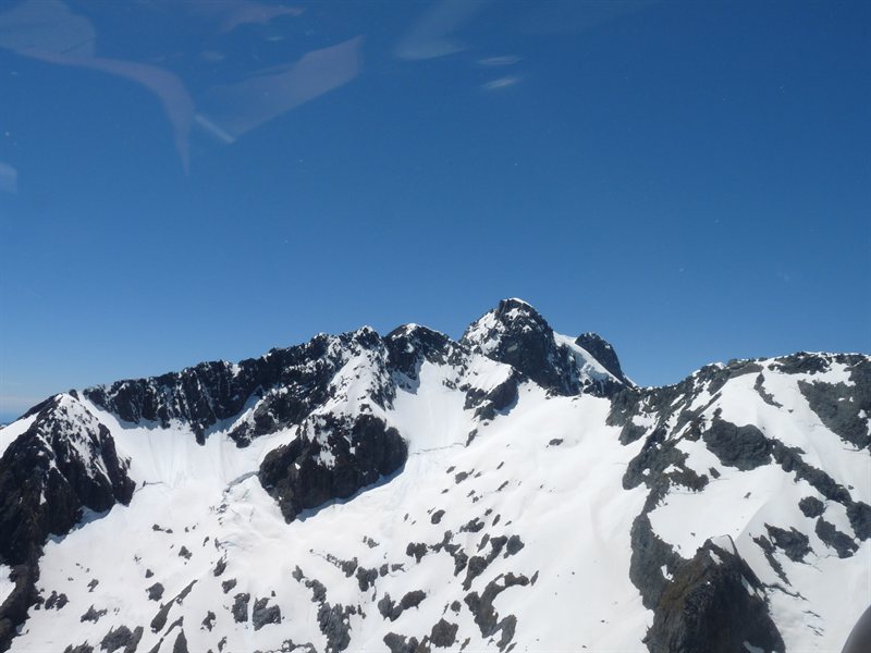 Snow capped mountains viewed from the helicopter