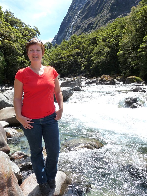 Claire next to the Cleddau River on the road to Milford Sound