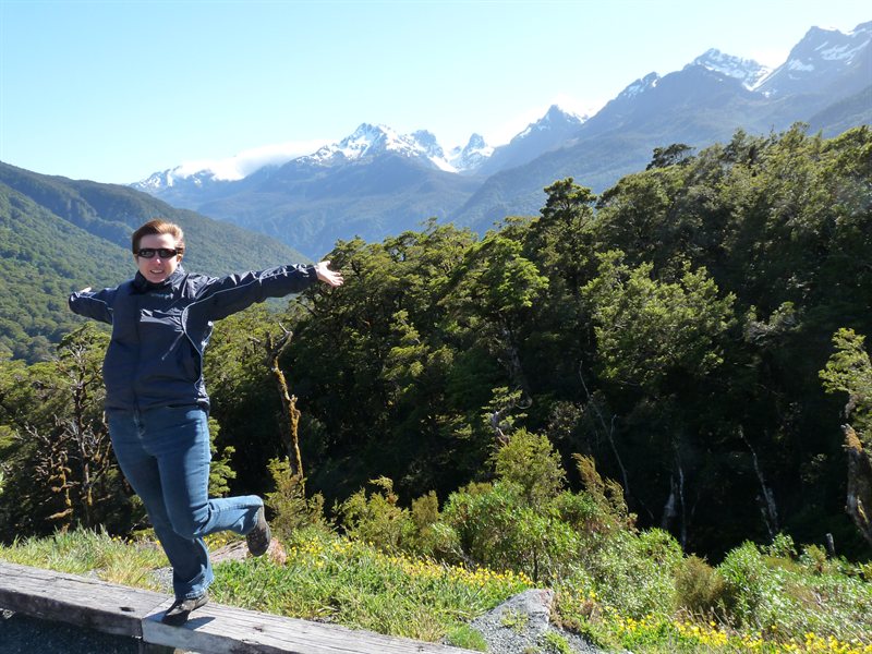 Claire and the snow-capped peaks on the way to Milford Sound