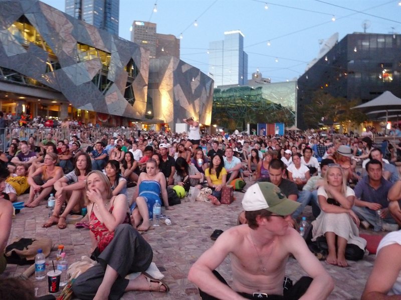Crowds watching the tennis in Federation Square