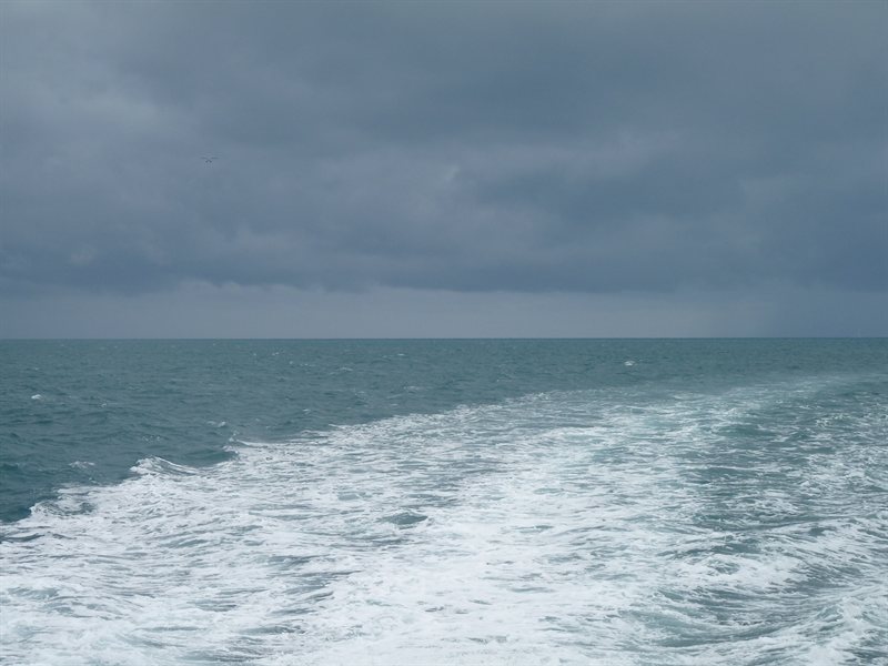 Leaving the Reef and the dark clouds