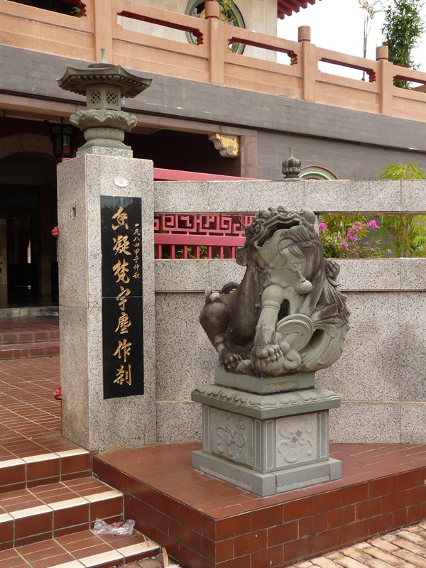 Lion statue outside temple in Melaka
