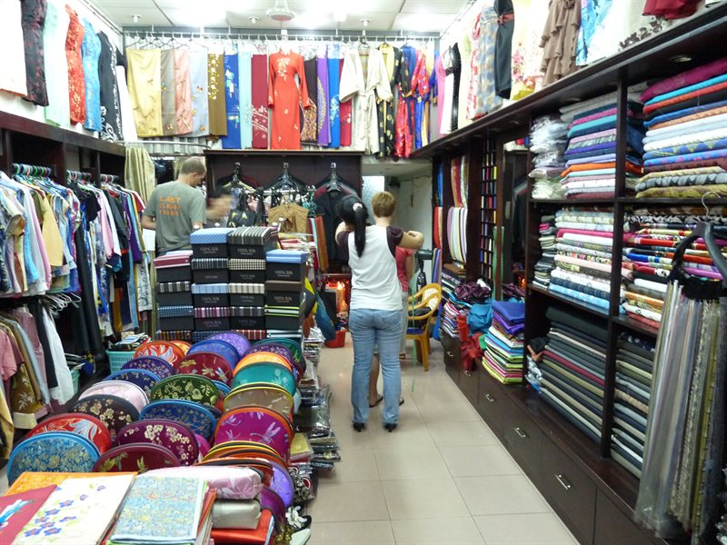 Getting measured at the tailors