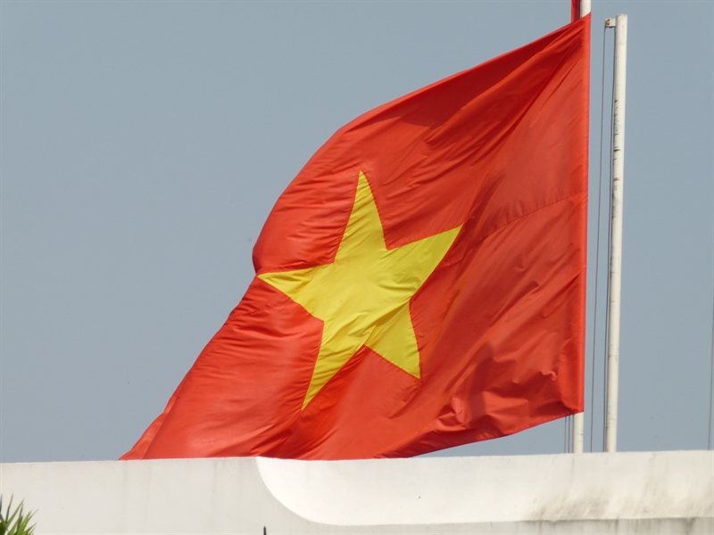 Flag flying over the Reunification Palace in HCMC