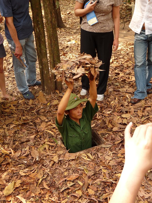 Demonstrating a Viet Cong hideaway