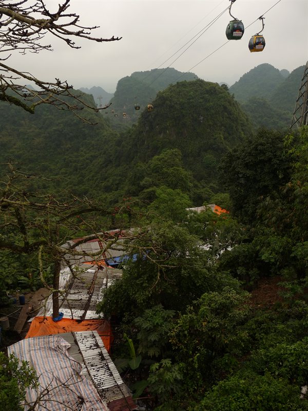 The walkway to the top, covered with tarps, and corrugated tin