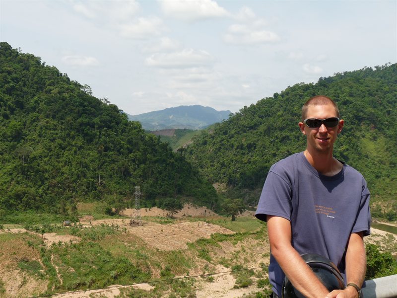Ed with the mountains of the Ho Chi Minh Trail