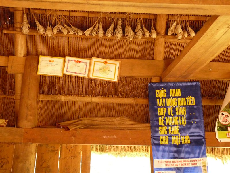 Skulls lining the community house in a minority village