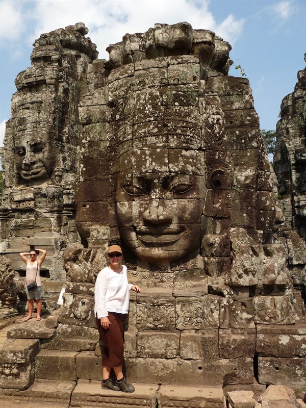 Claire and a stone carved face at Bayon Temple