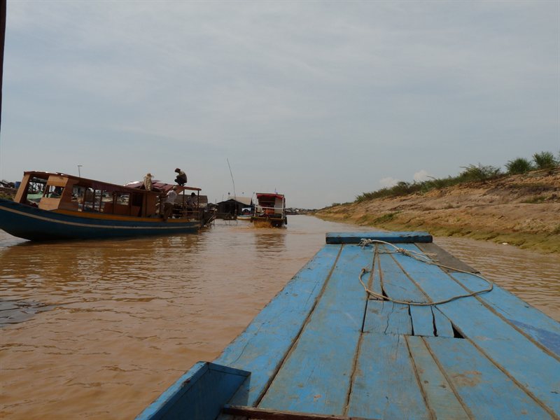 Procession of boats going to Chong Khneas floating village