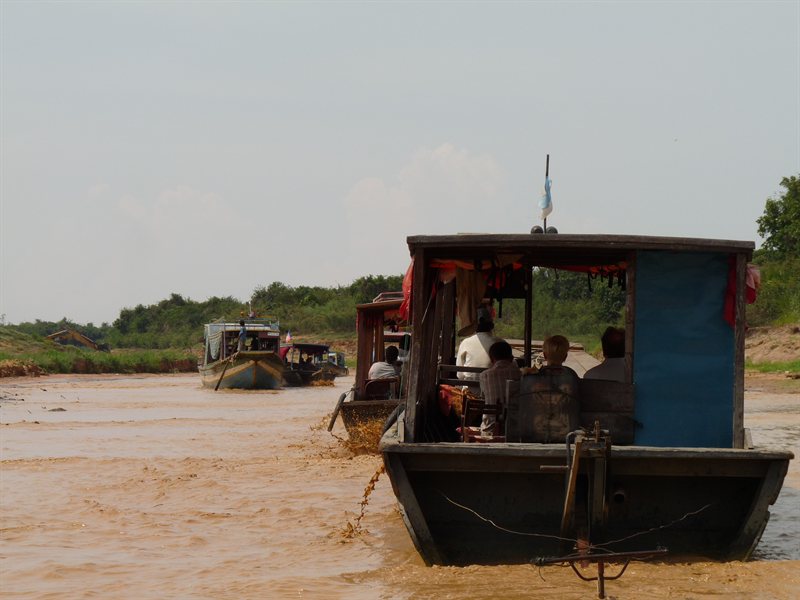Procession of boats going to Chong Khneas floating village