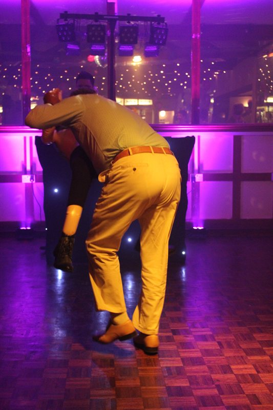 Mr Gray dancing with someone